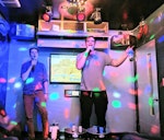 Chris Biscardi and Dustin Schau show off their karaoke skills.