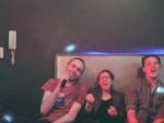 Marisa Morby, Dustin Schau, and Michał Piechowiak getting in on the Karaoke